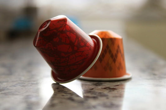 The Battle of Coffee Pods:  Refillable vs. Prefilled