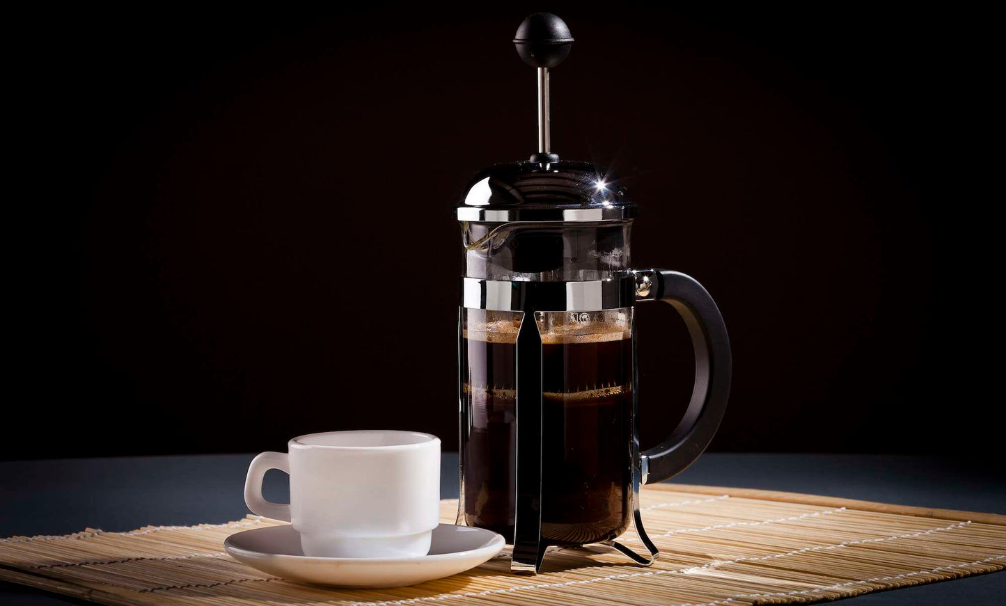 French press coffee maker sitting on a counter